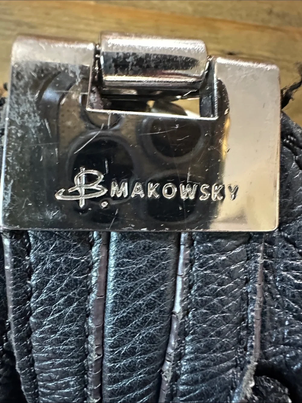 B Makowsky- large black slouchy bag. 100% leather with silver buckles.